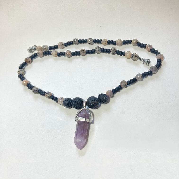 Simple crystal point with wood, amethyst, and lava stone beads