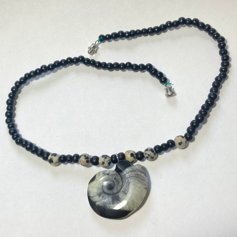 Fossilized ammonite with dalmation jasper and wooden beads