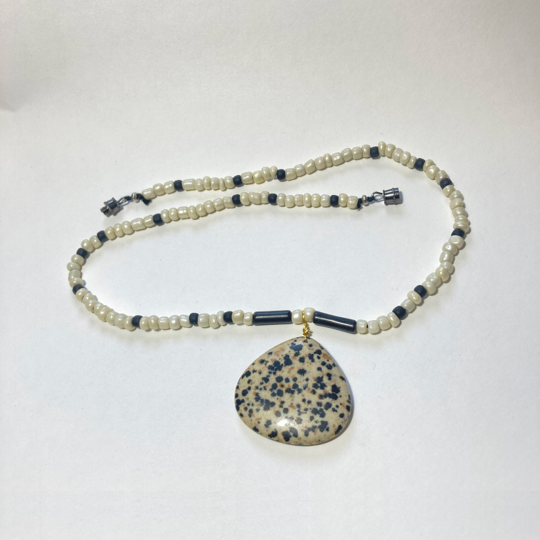Large dalmation jasper pendant with glass beads and black jasper tubes
