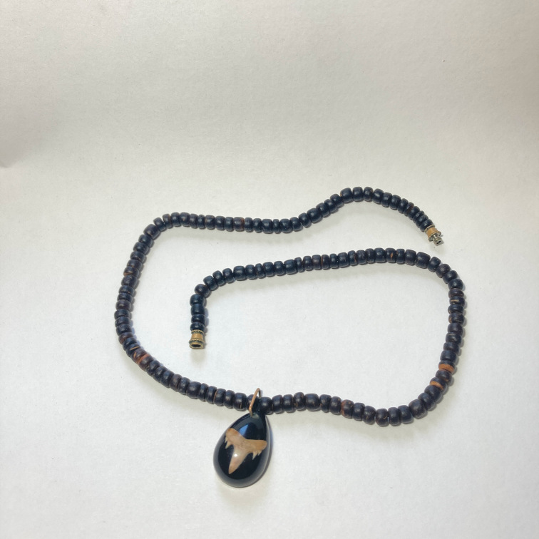 Shark tooth in resin with wooden beads